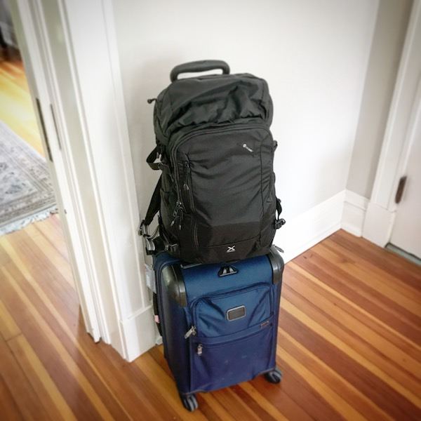 tumi suitcase and pacsafe backpack